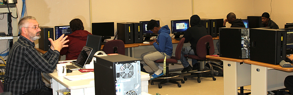 Instructor and students in computer lab