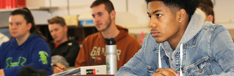 Criminal justice students sitting at desk